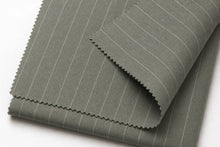A folded piece of gray fabric with thin white pinstripes, shown on a clean white background.